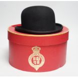 Two Bowler hats; a boxed example by Christys’ London and an unboxed hat by Pytchley with chin strap