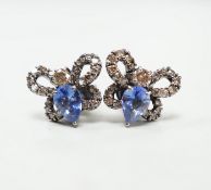 A pair of 750 white metal, sapphire and diamond cluster set bug earrings, width 13mm, gross weight