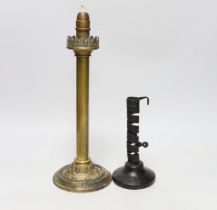 A Palmer & Co. brass lamp and an ejector candlestick, tallest 35cm