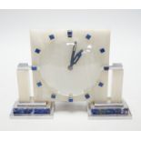 An Art Deco Smiths onyx and lapis lazuli mantel clock, 21.5cm wide