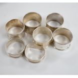 Sixteen assorted silver napkin rings, various dates and makers.