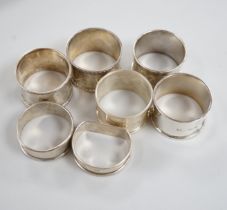 Sixteen assorted silver napkin rings, various dates and makers.