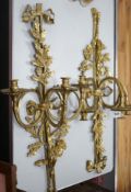 A pair of brass three branch wall sconce lights, 90cm high