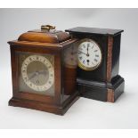 A black slate mantel clock and a walnut mantel clock, 25cm