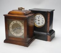 A black slate mantel clock and a walnut mantel clock, 25cm
