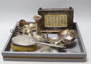 A group of small silverwares including toast rack, cigarette case, miniature Monteith style bowl,