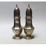 A pair of George V octagonal silver sugar casters, Birmingham, 1932, 19.5cm, 8.9oz.