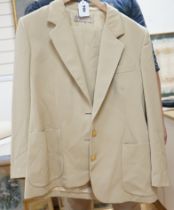 A lady's vintage Gucci beige wool suit Single breasted jacket and skirt Italian size 46