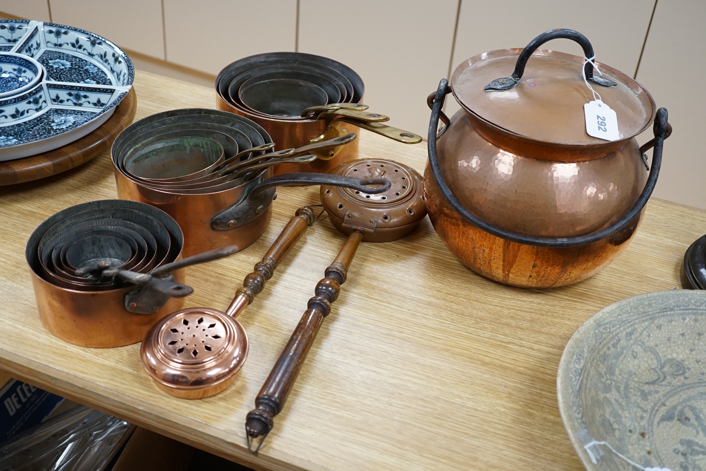 A quantity of various copper-ware including graduated pans, lidded cauldron and miniature warming - Image 2 of 4