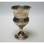 An early Victorian embossed silver pedestal goblet, makers mark rubbed, possibly F.P?, London, 1843,