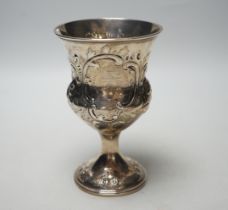 An early Victorian embossed silver pedestal goblet, makers mark rubbed, possibly F.P?, London, 1843,