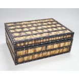 A 19th Century Ceylonese ebony, porcupine quill and bone inlaid sewing box with contents including