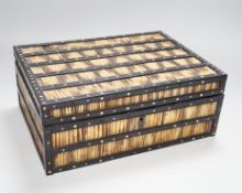 A 19th Century Ceylonese ebony, porcupine quill and bone inlaid sewing box with contents including