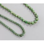 Two single strand graduated jade bead necklaces, 52cm & 84cm.