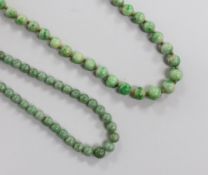 Two single strand graduated jade bead necklaces, 52cm & 84cm.
