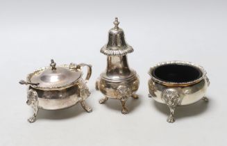 An Elizabeth II Garrard & Co silver three piece condiment set, London, 1975.