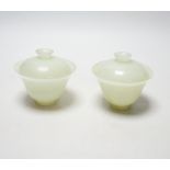 Pair of Chinese pale celadon jade footed bowls and covers, 9cm high