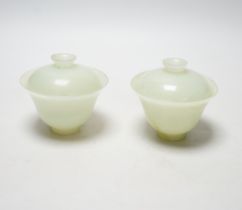 Pair of Chinese pale celadon jade footed bowls and covers, 9cm high