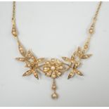 An Edwardian 15ct and seed pearl set drop necklace, 44.5cm, gross weight 8.6 grams.