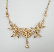 An Edwardian 15ct and seed pearl set drop necklace, 44.5cm, gross weight 8.6 grams.