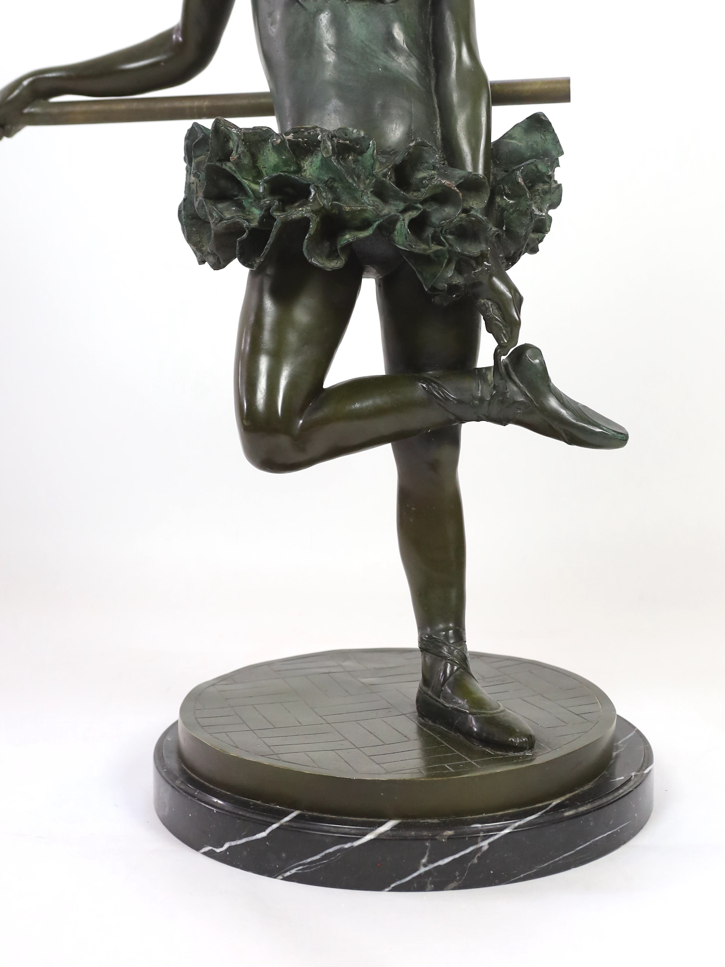 After Auguste Moreau (French, 1834-1917). A bronze figure of a ballerina, Standing leaning against a - Image 3 of 5