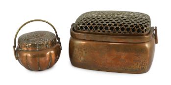 Two Chinese copper hand warmers, the largest signed ‘Zhang Mingqi', 18th/19th century, the largest