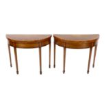 A pair of Edwardian Sheraton revival marquetry inlaid satinwood card tables the D shaped folding top
