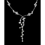 A modern 18k white gold and diamond cluster set necklace, with interwoven motif, 50cm, gross