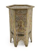 A Cairo ware silver and copper inlaid brass Qur’an stand, early 20th century, in Mamluk revival