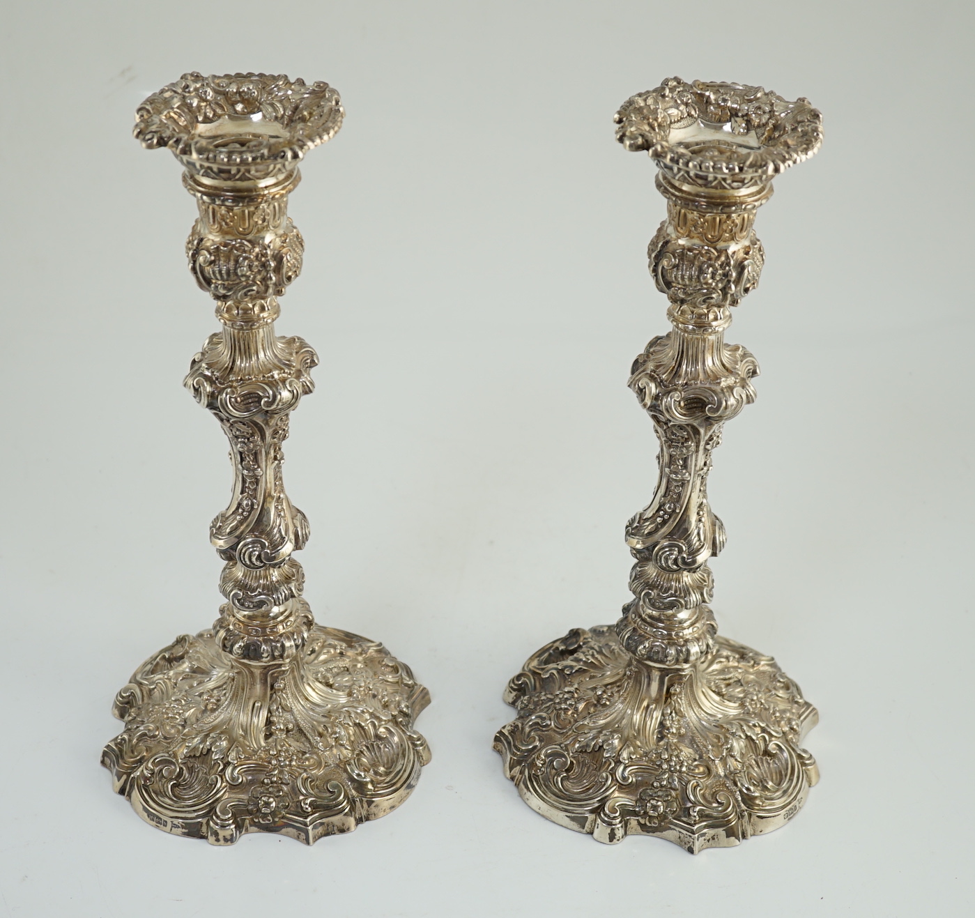 An ornate pair of Edwardian silver candlesticks, by Walker & Hall, with fixed sconces, waisted - Image 4 of 11