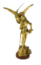 Emmanuel Fremiet (French, 1824-1910). A gilt patinated bronze, St Michael and the dragon, signed