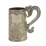 A 19th century Chinese silver mug, makers mark LC?, with dragon handle and embossed with