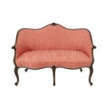 A Hepplewhite style mahogany settee with shell carved gadrooned frame on cabriole legs, width 140cm,