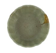 A Chinese Longquan celadon fluted brush washer, Yuan dynasty, crackle to the glaze all over, burnt