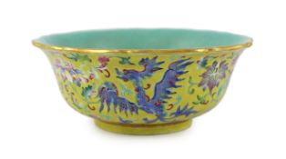 A Chinese yellow ground ‘phoenix’ bowl, Daoguang mark and of the period (1821-50), the exterior