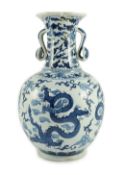A Chinese blue and white ‘dragon’ vase, Wanli mark but later, painted with dragons amid scrolling