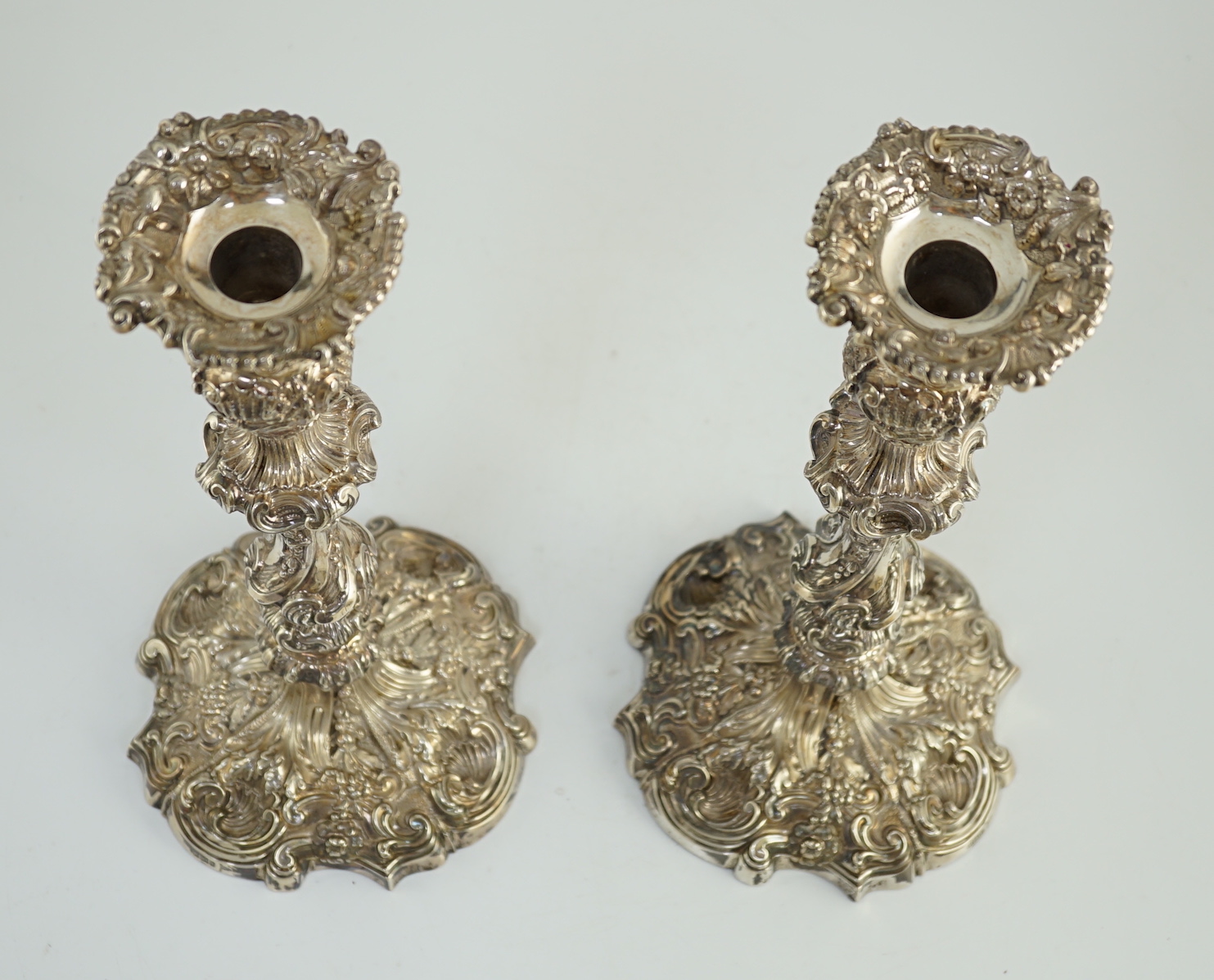 An ornate pair of Edwardian silver candlesticks, by Walker & Hall, with fixed sconces, waisted - Image 5 of 11