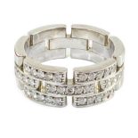 A modern Cartier 18ct white gold and diamond cluster set Panthere Maillon band, signed and