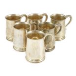 A set of six George VI silver mugs, by Mappin & Webb, with scroll handles, London, 1946, height 11.