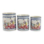 A graduated set of three Chinese famille rose mugs, Qianlong period, each painted with court