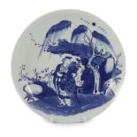 A Chinese blue and white ‘Shou Lao’ dish, Yongzheng period, painted with the immortal, a deer amid