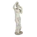 After the Antique. A late 19th century Italian carved white marble figure of Venus Anadyomene