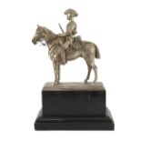 An early 20th century silver model of a City Imperial Volunteer, holding a rifle, on horseback