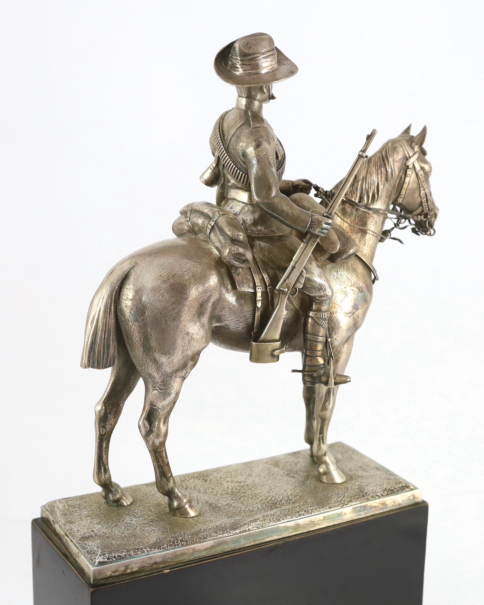 An early 20th century silver model of a City Imperial Volunteer, holding a rifle, on horseback - Image 7 of 7