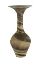 Dame Lucie Rie D.B.E. (1902-1995), a stoneware trumpet neck vase, covered in cream and dark brown