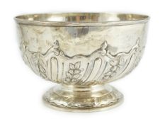 An Edwardian repousse silver rose bowl, by Daniel & John Welby, with fluted and foliate