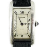 A 1920's 18ct white gold Cartier Tank Cintree (7 lignes model) manual wind wrist watch, with