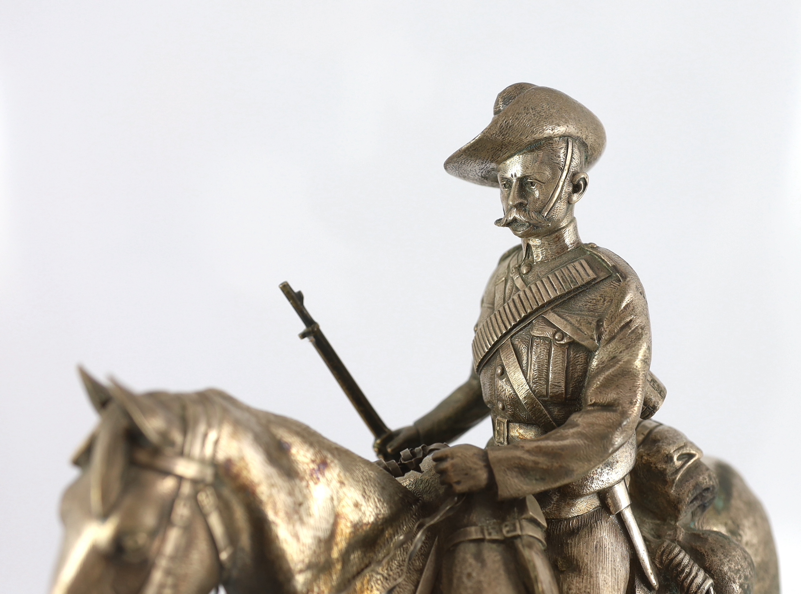 An early 20th century silver model of a City Imperial Volunteer, holding a rifle, on horseback - Image 4 of 7