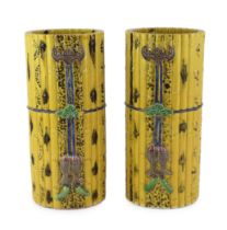 A pair of Chinese faux bamboo porcelain hat stands, late 19th century, each glazed in colours in