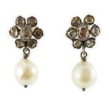 A pair of early 19th century silver, rose cut diamond and baroque pearl set drop earrings, with